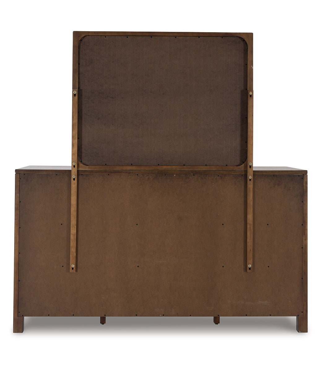 Cabalynn King Upholstered Bed with Mirrored Dresser