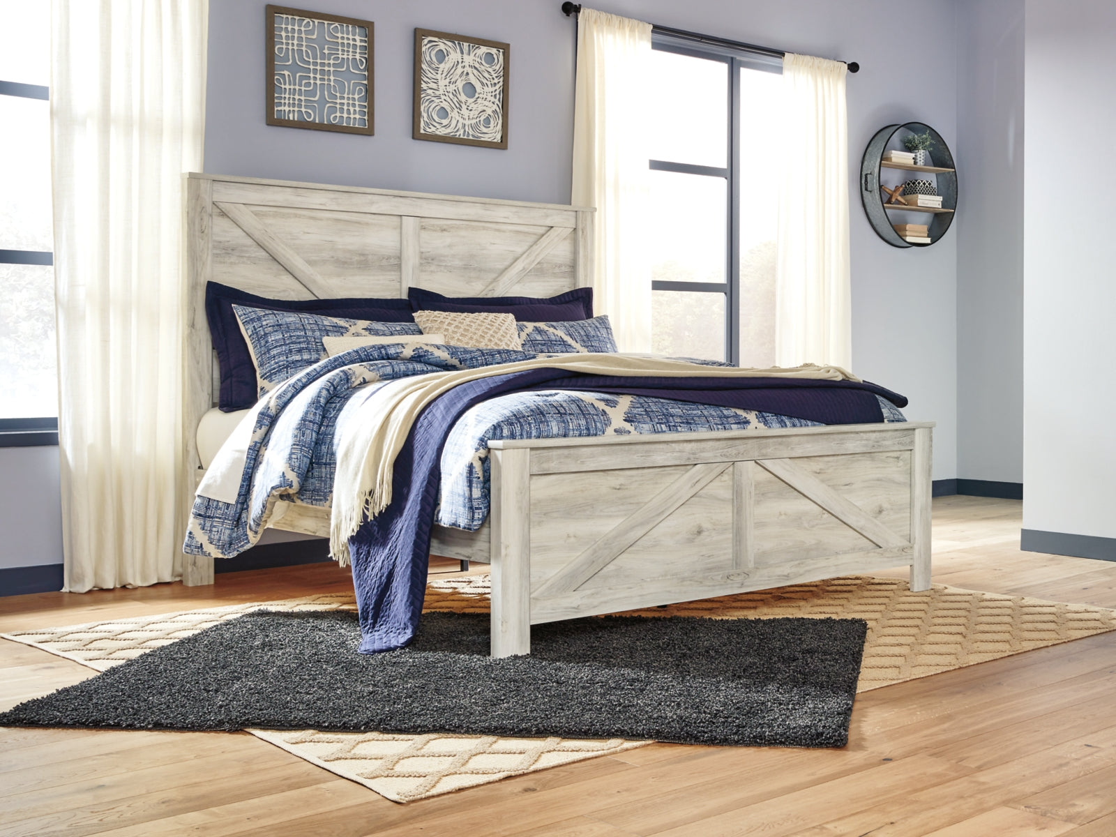 Bellaby King Crossbuck Panel Bed with Mirrored Dresser