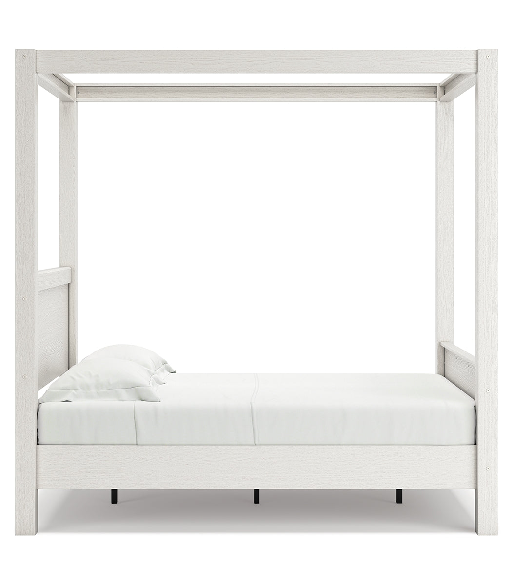 Aprilyn Full Canopy Bed with Dresser and 2 Nightstands